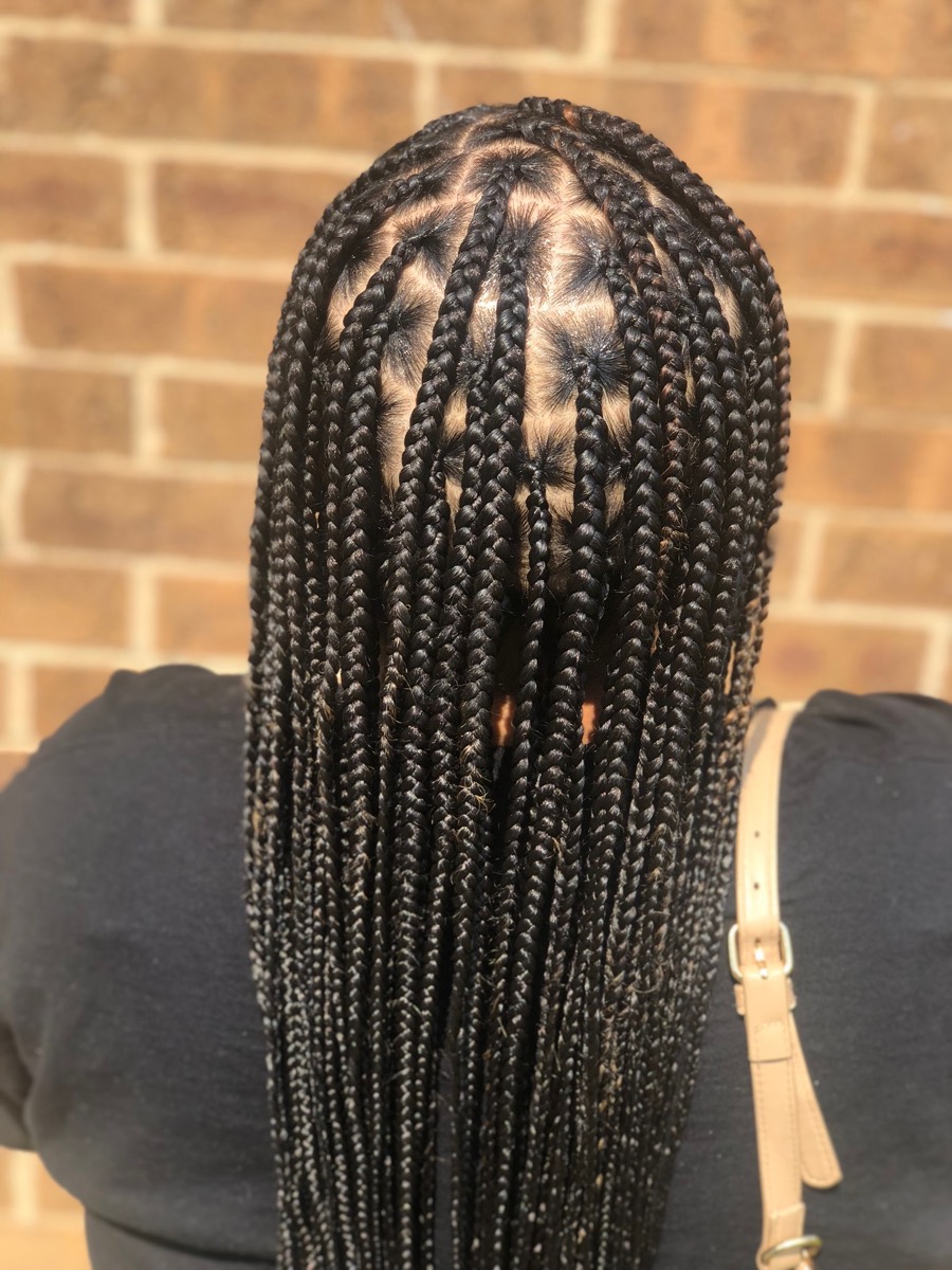 Freshly installed knotless braids, viewed from behind